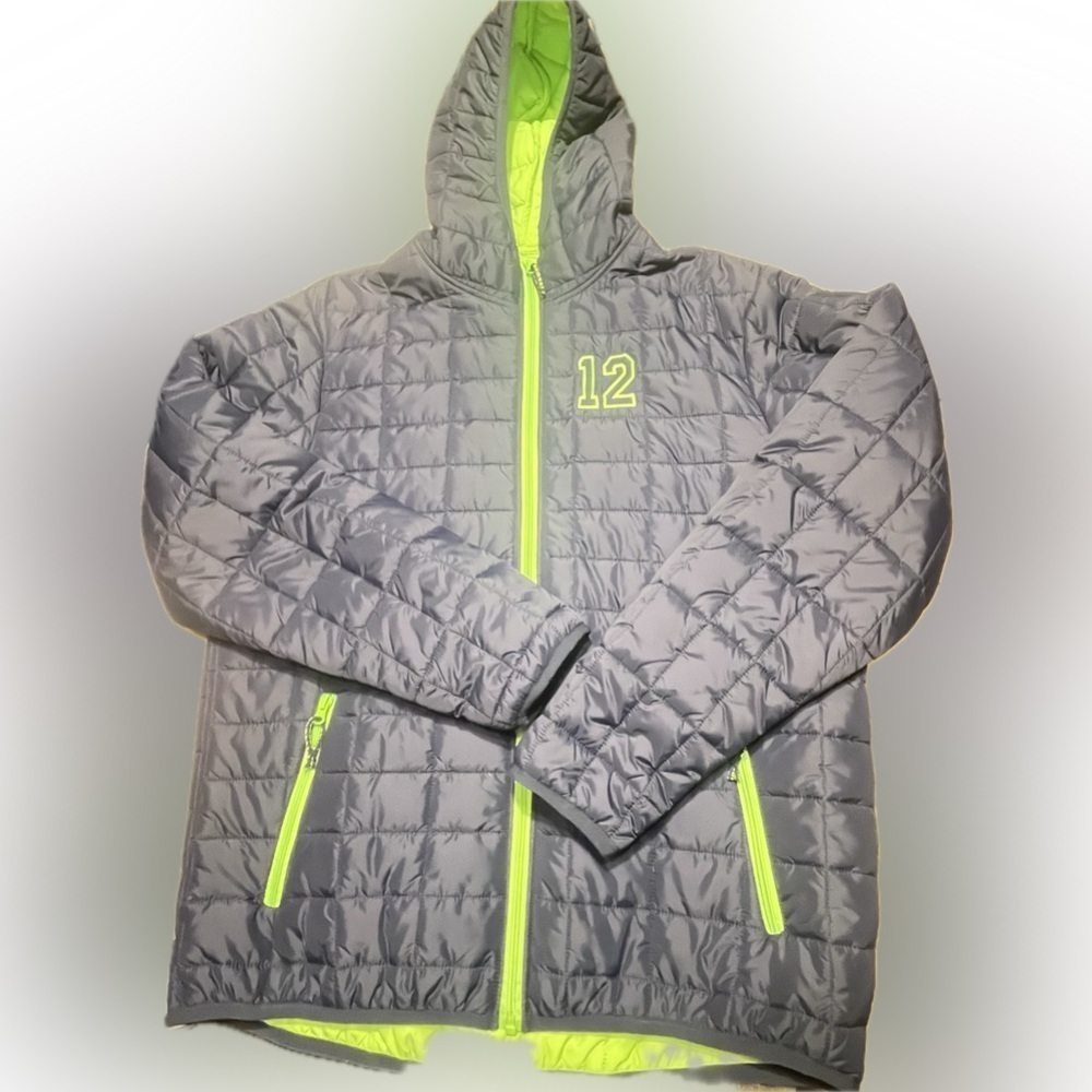 Seahawks puffy coat, zipper pockets, attached hood. Dutch Harbor Gear brand- 2XL